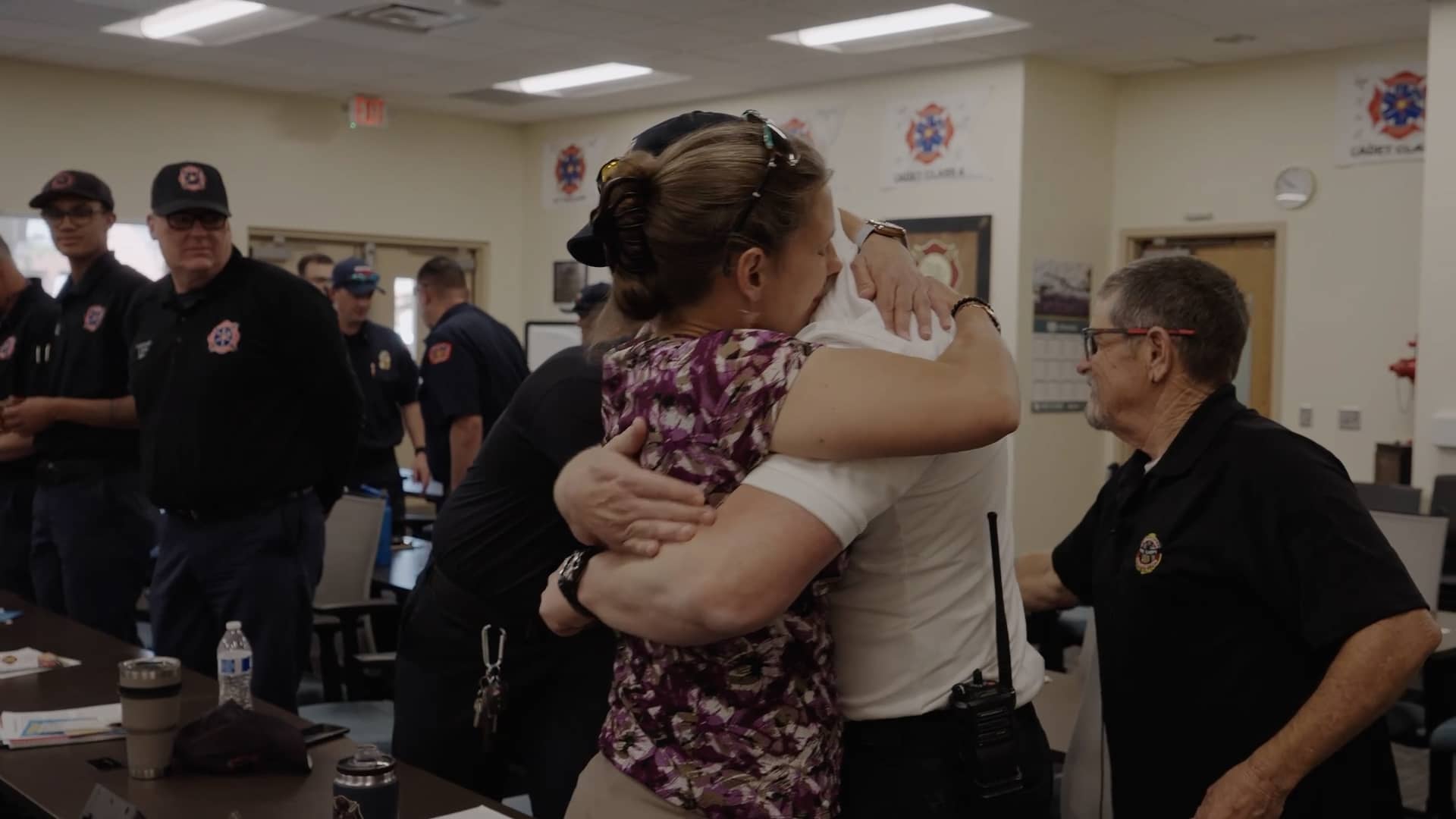 Laura_Ngyuen_Hug_With_Firefighter