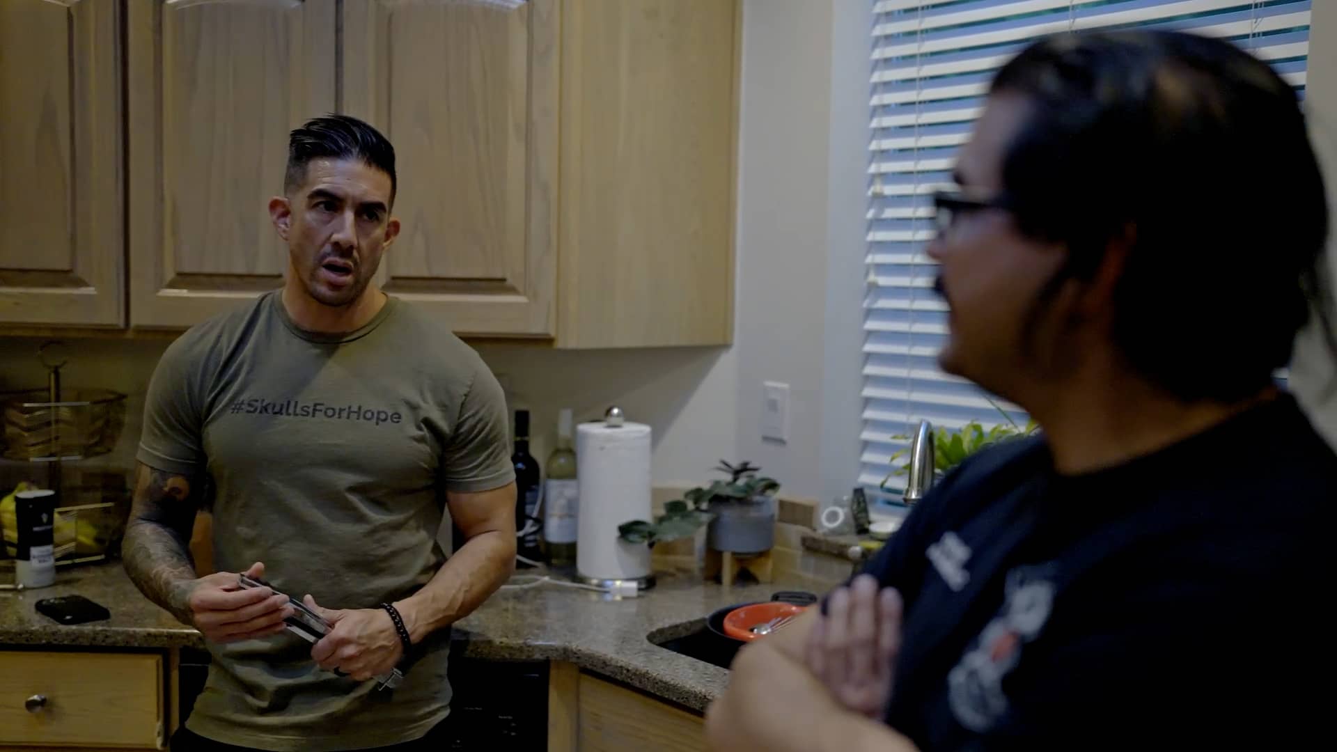 Robert_Arrieta_Talking_With_Fellow_Firefighter