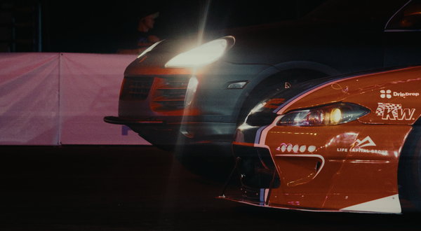 Jota Racing Challenge — 05 Two drift cars side by side, headlights on, during the night shoot